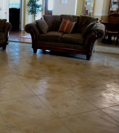 Living room in residential home in Kalamazoo, Michigan with stamped concrete floors.
