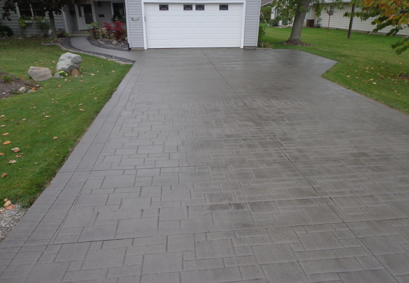 Photo of a stamped and stained driveway.